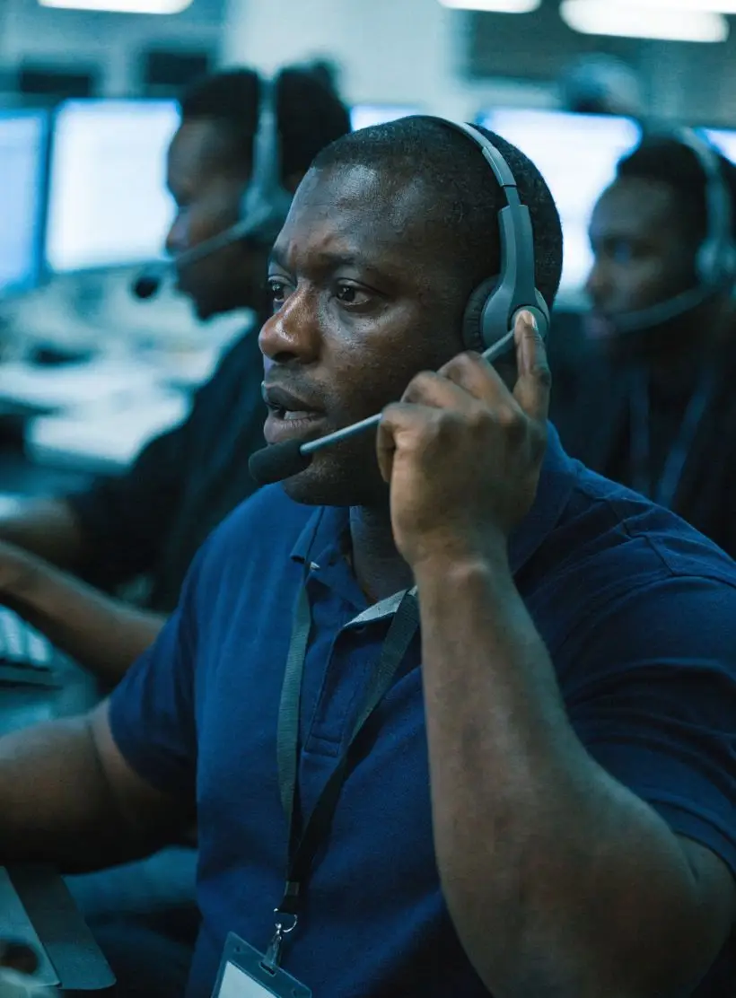 A call-center agent under pressure during a volume spike